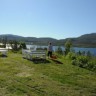 Sandnes Fjord Camping - Sitting group next to the kiosk/expedition. To barbeque and have a beautiful view of the fjord and mountains.