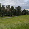 Brøttum Camping - Campsite seen from the road