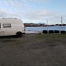 Sjøstrand Rorbuer & Fisk v/ Børge Iversen AS - Womo Stellplatz direkt am Hafen mit Blick auf die Stadt