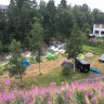 Øen Turistsenter AS - tents by the river